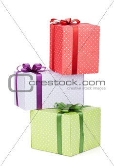 Three gift boxes with ribbon and bow