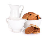 Bowl with cookies and milk