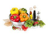Fresh bell peppers, herbs and condiments