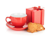 Red coffee cup and heart shaped cookies and gift box