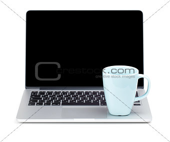 Tea cup on laptop