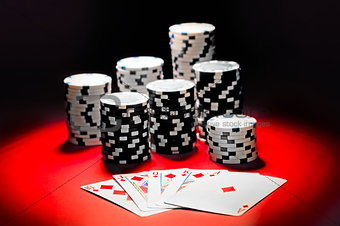 Poker, royal flush and gambling chips.