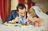 groom and bride  together in cafe
