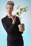 successful career girl with money plant