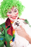 Female clown with a white rabbit