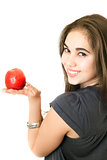 Joyful girl with an apple
