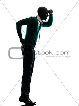 african black man standing tiptoe looking away silhouette