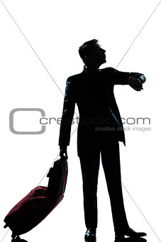 silhouette man business traveler man checking the time