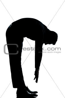 silhouette man stretching back full length