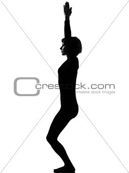 utkatasana chair position yoga woman