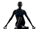 woman exercising yoga sitting stretching