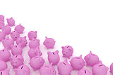 Piggy banks in corner with copyspace