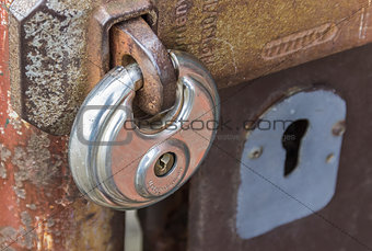 Steel lock on rusty gate