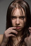 wet woman with angry expression