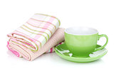 Coffee cup and kitchen towels