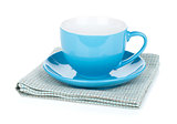 Coffee cup over kitchen towel