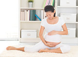 Asian 8 months pregnant woman 