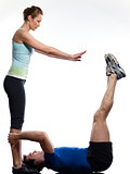 couple,man and woman doing abdominals workout push ups