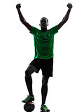 african man soccer player  celebrating victory silhouette