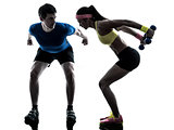 woman exercising fitness weight training with man coach