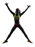 woman jumping arms raised silhouette