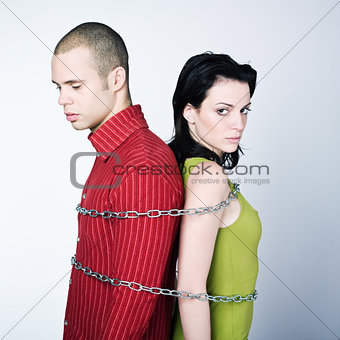 young couple chained