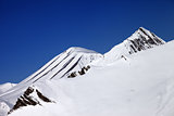 Off-piste slope and blue clear sky in nice day