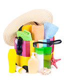 Bag with towels, sunglasses, hat and beach items