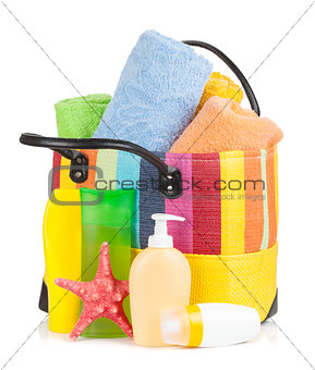 Bag with towels, sunglasses and beach items