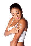 Woman applying Moisturizing lotion