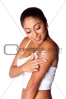 Woman applying Moisturizing lotion