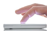 Close up of a finger touching smart phone