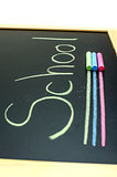 Color chalks on blackboard