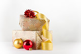 Christmas gifts with golden ribbon