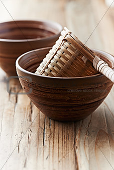 Bamboo tea strainer in a ceramic cup