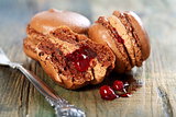 Macaroons with chocolate-berry filling.