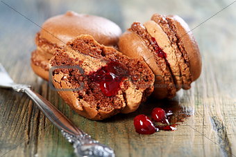 Macaroons with chocolate-berry filling.