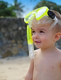 Cute little boy with snorkel gear