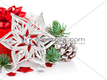christmas tinsel with branch firtree and red gift