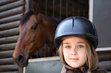 Little girl and brown Horse