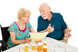 Senior Couple Discussing Medical Expenses