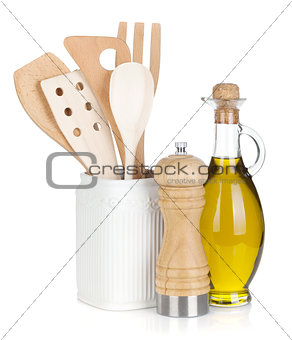 Kitchen utensils in holder and condiments