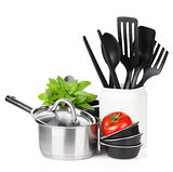 Kitchen utensils, tomato and mint leaves