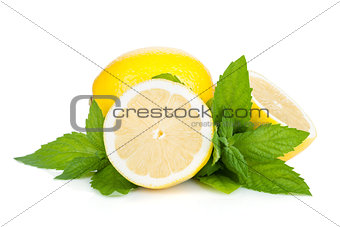 Three ripe lemons and mint
