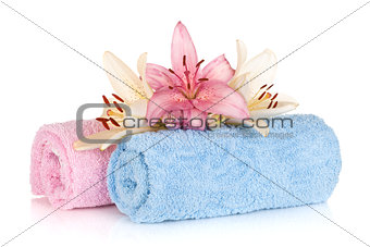 Spa setting with colorful lily flowers