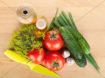 Ripe vegetables and knife