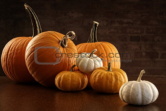 Pumpkins and gourds on table