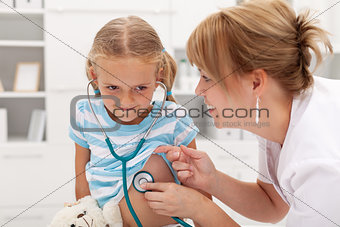 Little girl at the doctor for a checkup