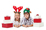 Christmas kids with presents and funny hats - isolated