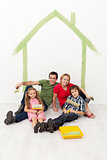 Happy family with kids redecorating their home